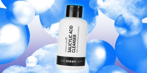 A white bottle with black cap AI-generated content may be incorrect.